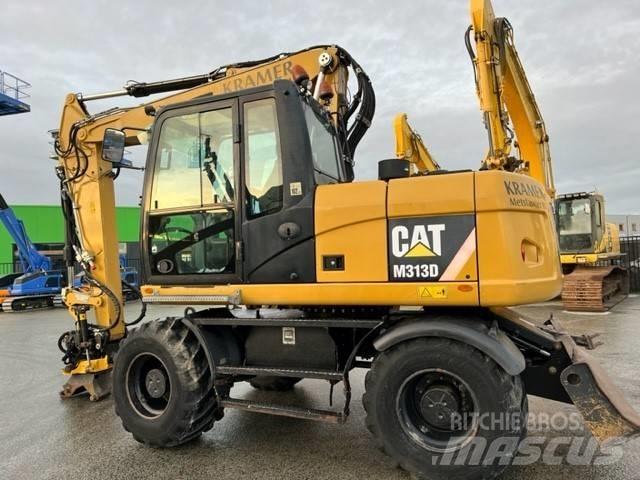 CAT M 313 D Колісні екскаватори