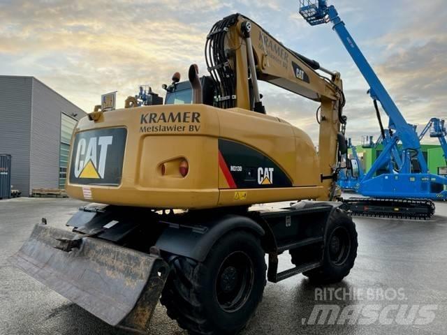 CAT M 313 D Колісні екскаватори