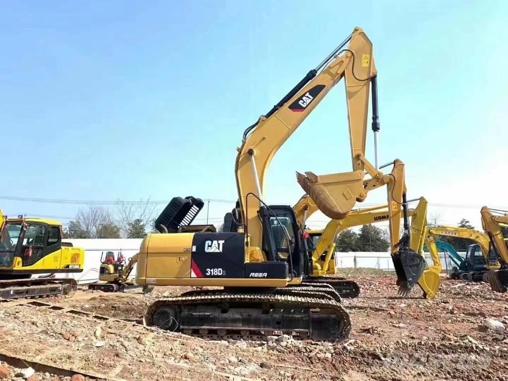 CAT 318d Гусеничні екскаватори