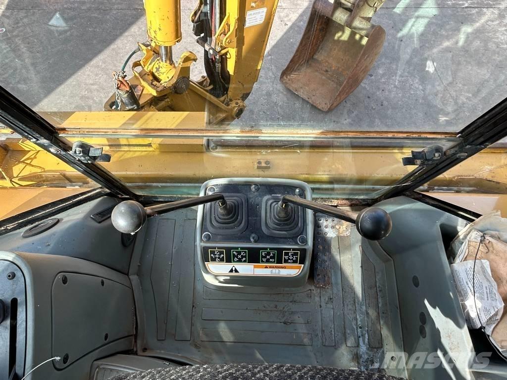 CAT 428 D Екскаватори-навантажувачі