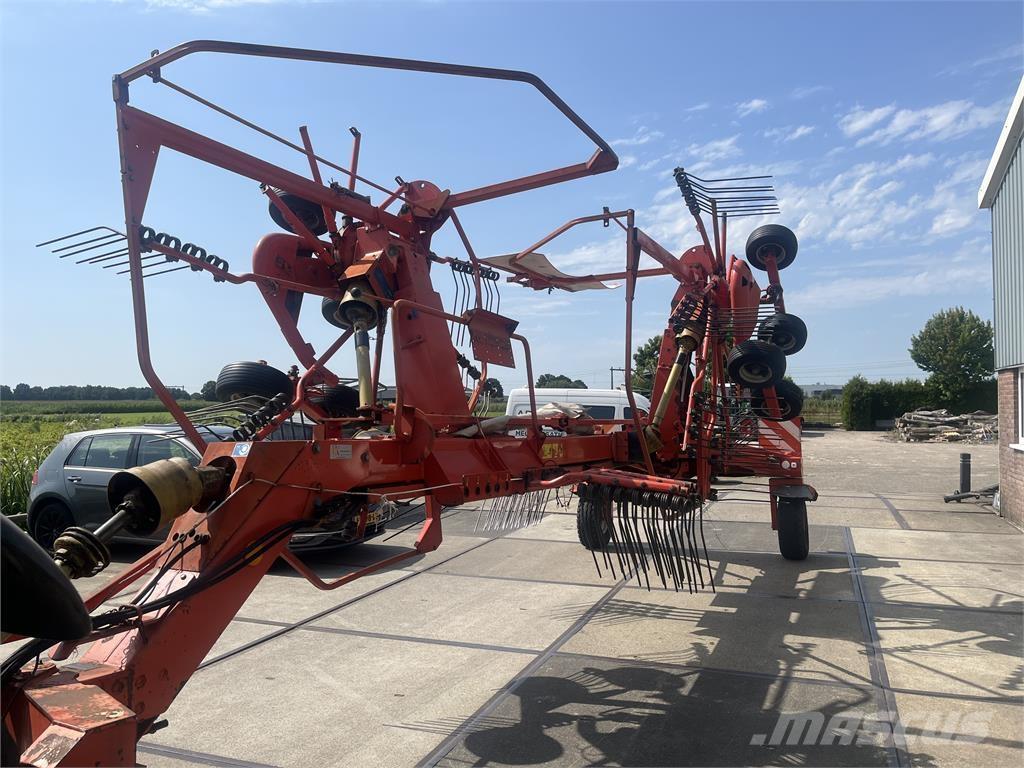 Kuhn 7302 DL Граблі і сінозворушувачі