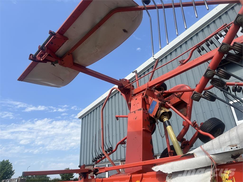 Kuhn 7302 DL Граблі і сінозворушувачі