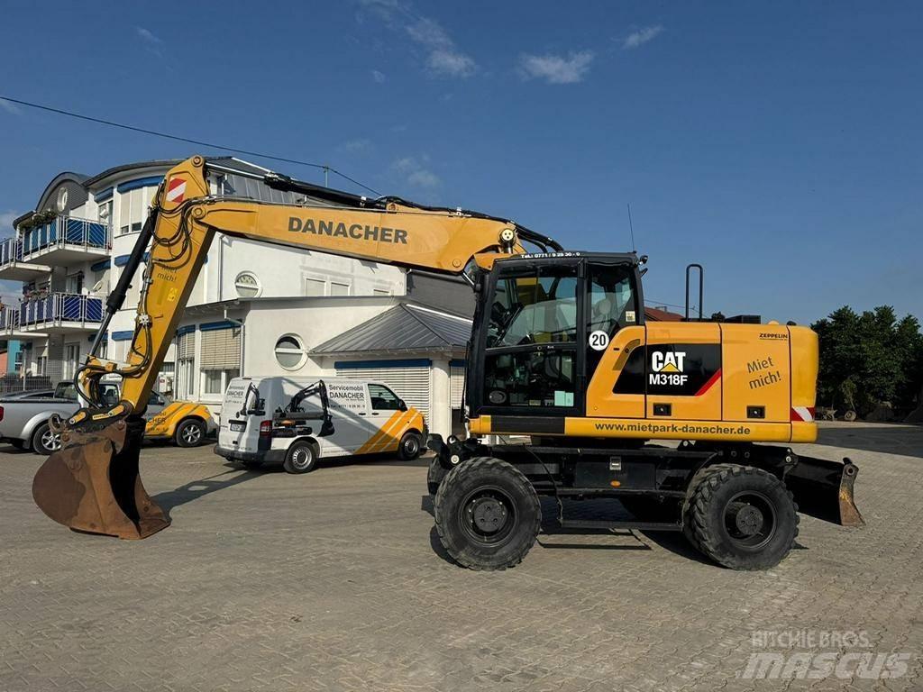 CAT M 318 F Колісні екскаватори