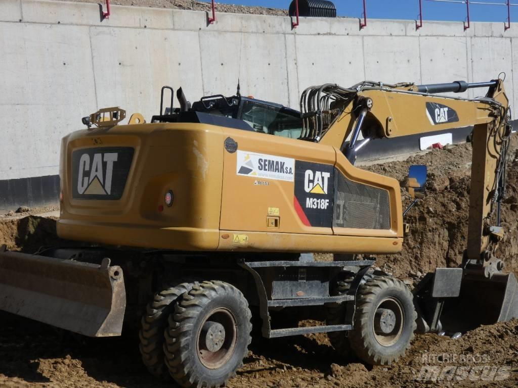 CAT M 318 F Колісні екскаватори