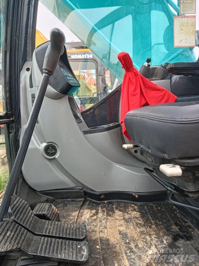 Kobelco SK 200 Середні екскаватори 7т. - 12т.