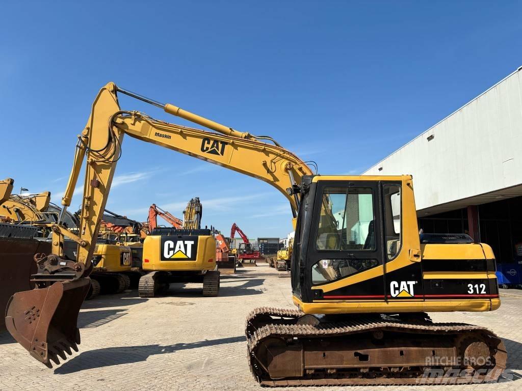 CAT 312 Гусеничні екскаватори