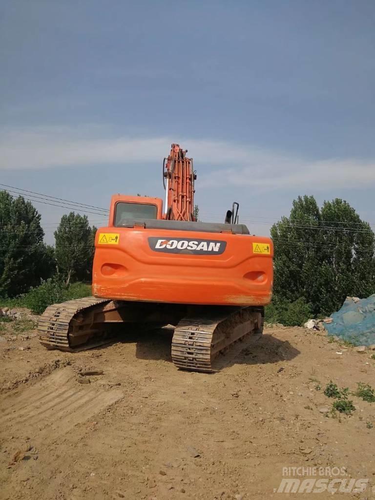 Doosan dx225 Гусеничні екскаватори