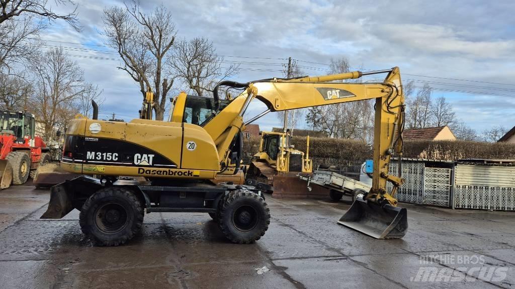 CAT M 315 C Колісні екскаватори