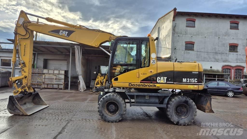 CAT M 315 C Колісні екскаватори