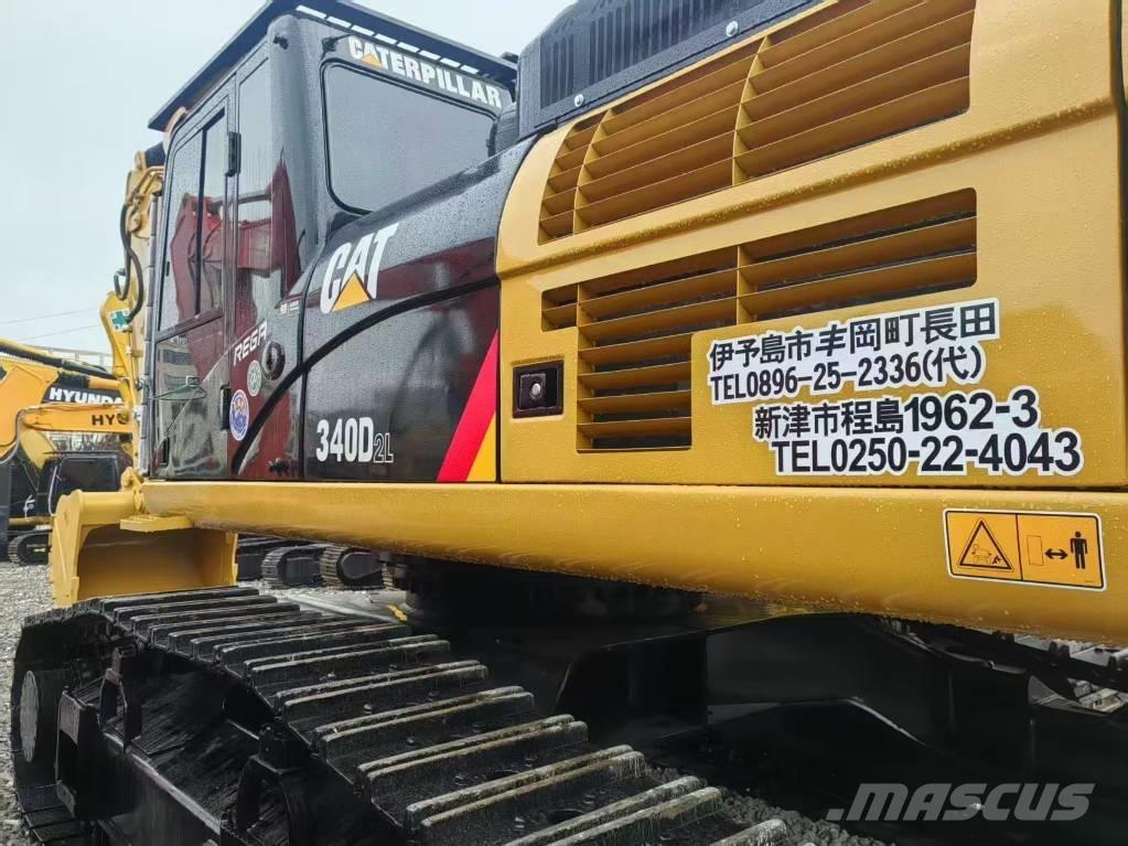 CAT 340 Гусеничні екскаватори