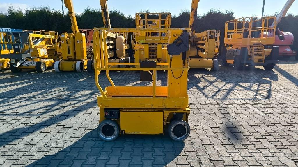 JLG 1230 ES Вертикальні щоглові підйомники