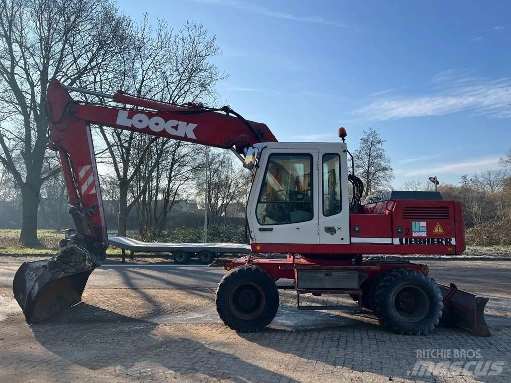 Liebherr 902 Колісні екскаватори