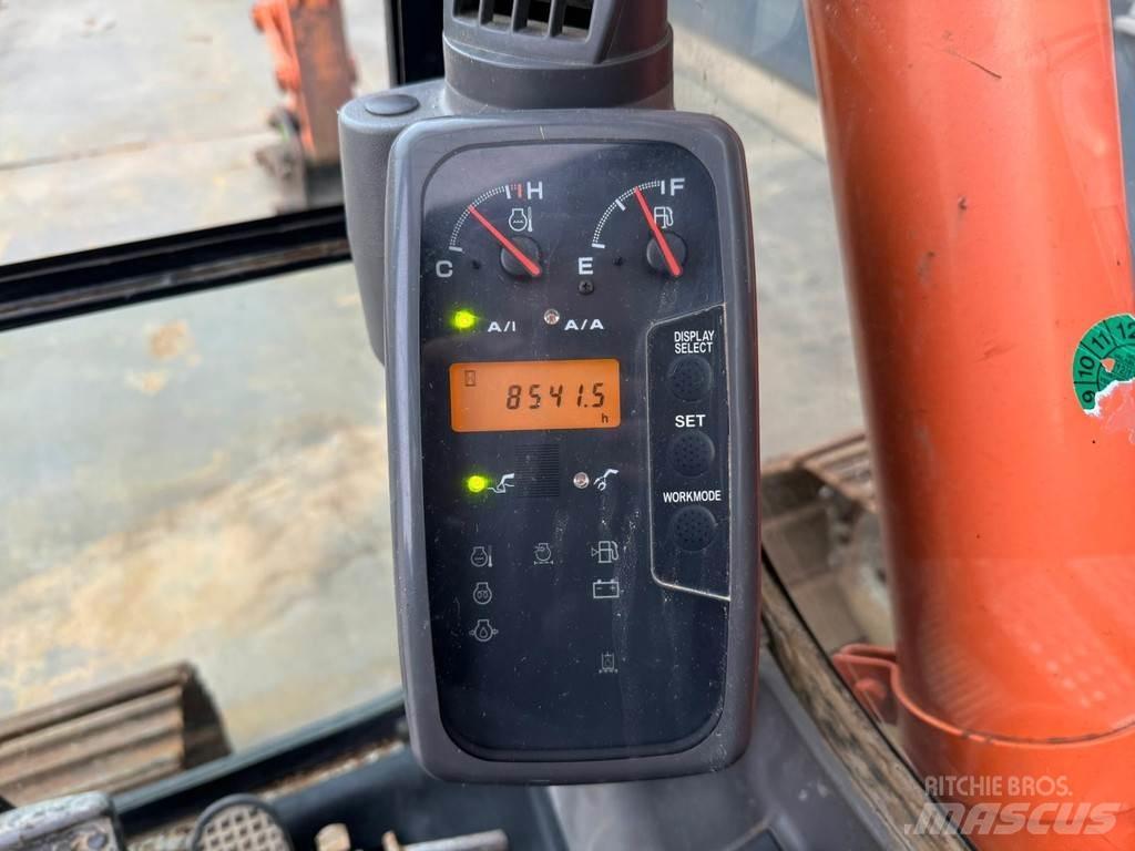 Hitachi ZX135US Гусеничні екскаватори
