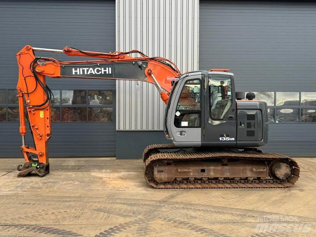 Hitachi ZX135US Гусеничні екскаватори