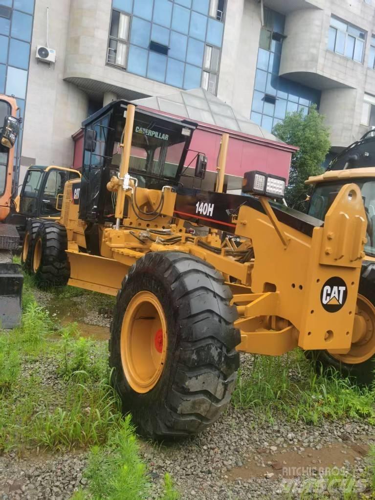 CAT 140 H Екскаватори-навантажувачі