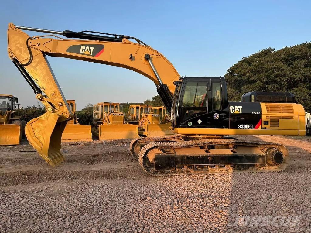 CAT 330DL Гусеничні екскаватори