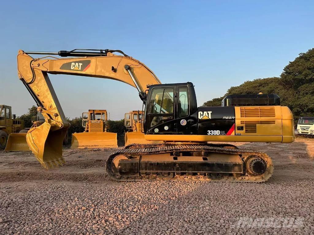 CAT 330DL Гусеничні екскаватори