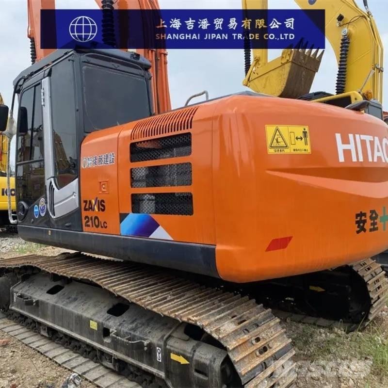 Hitachi ZX 210 Гусеничні екскаватори