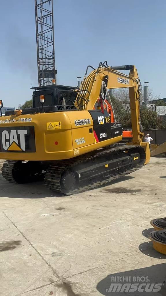 CAT 320 D L Гусеничні екскаватори
