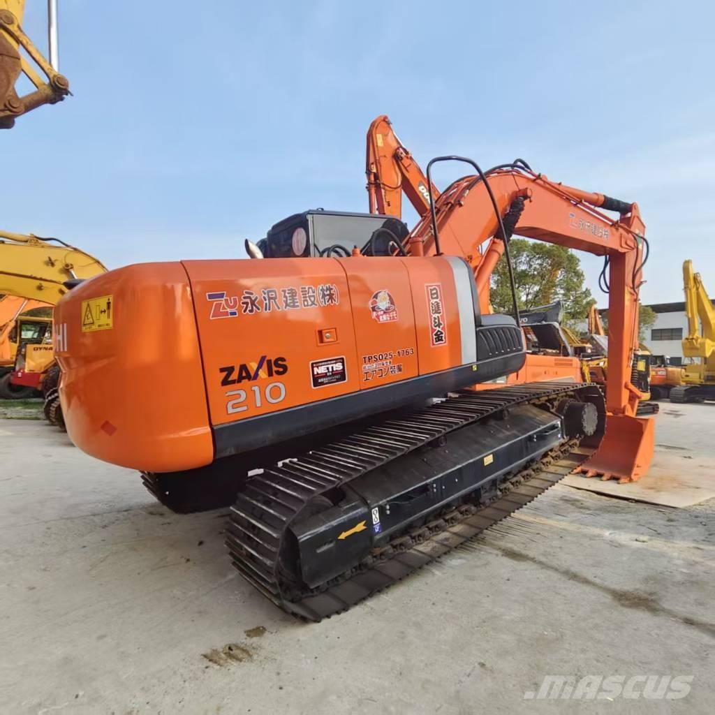 Hitachi ZX 210 Гусеничні екскаватори
