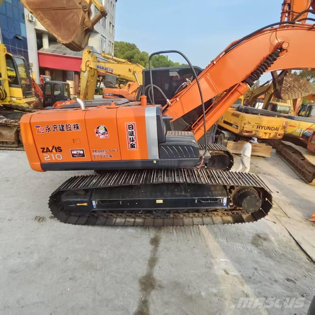 Hitachi ZX 210 Гусеничні екскаватори