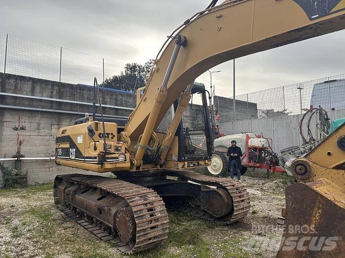 CAT 318B Спеціальні екскаватори