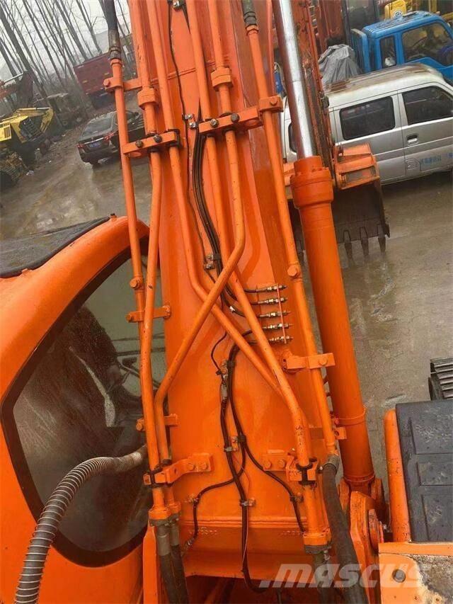 Doosan DX300 Гусеничні екскаватори