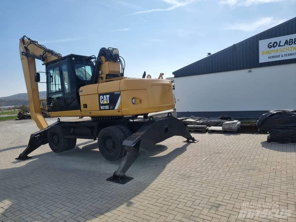 CAT 318D Перевантажувачі металобрухту/промислові навантажувачі