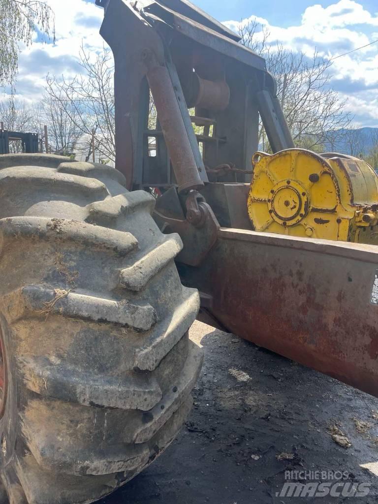 Timberjack 450C Трельовочні трактора
