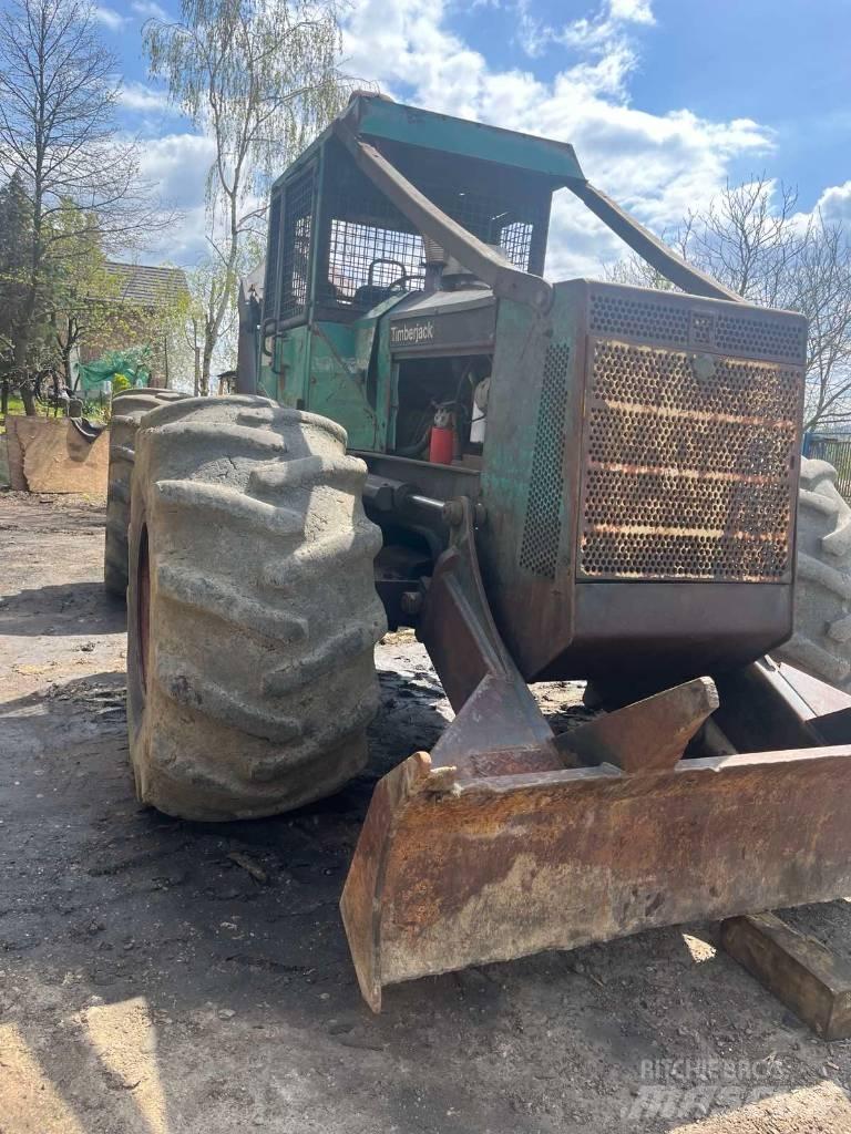 Timberjack 450C Трельовочні трактора