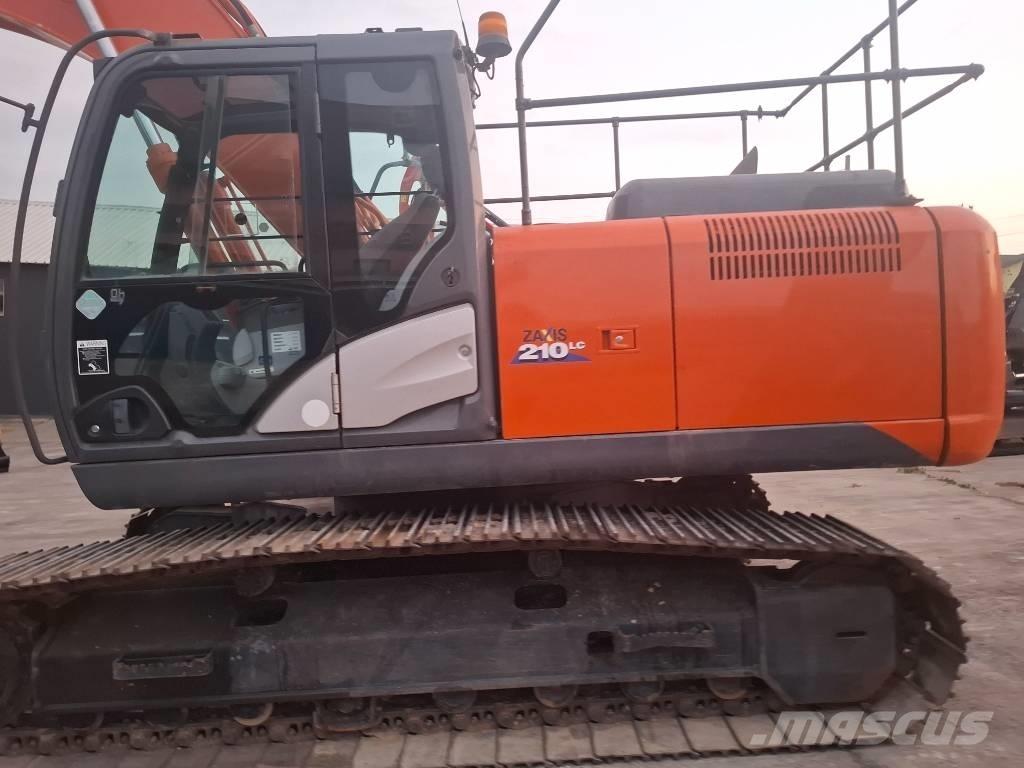 Hitachi 210LC Гусеничні екскаватори