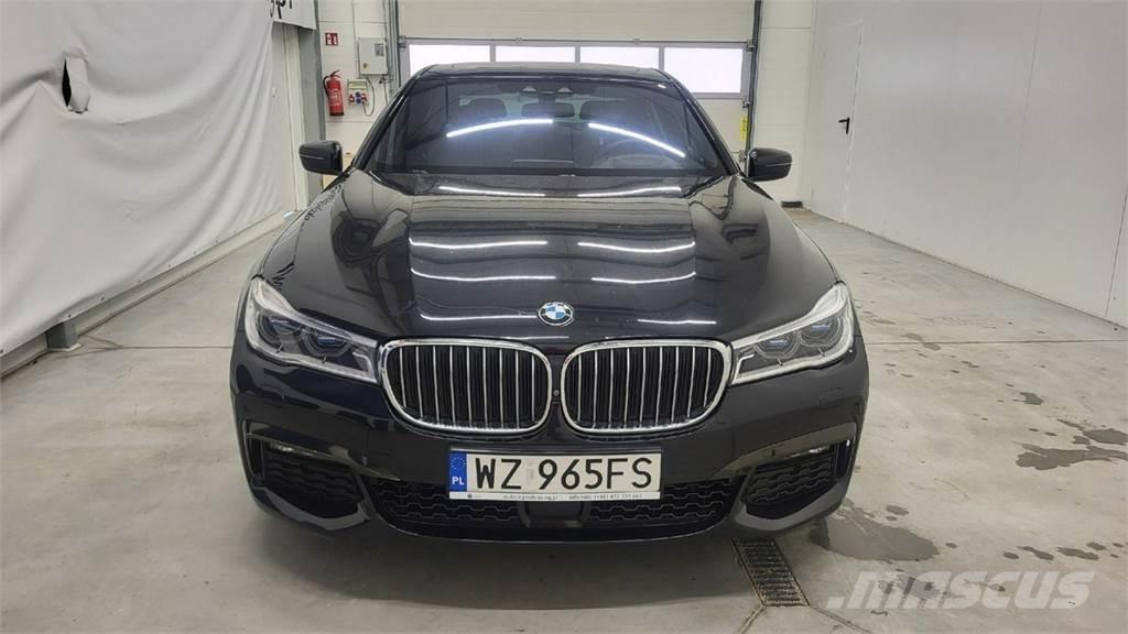 BMW 740 Автомобілі