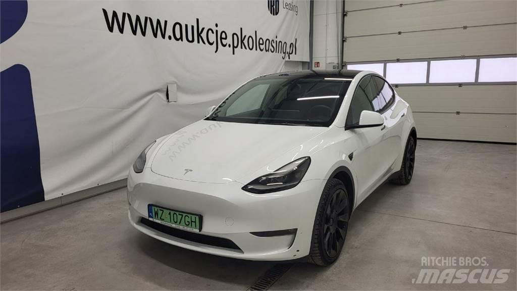 Tesla Y Автомобілі