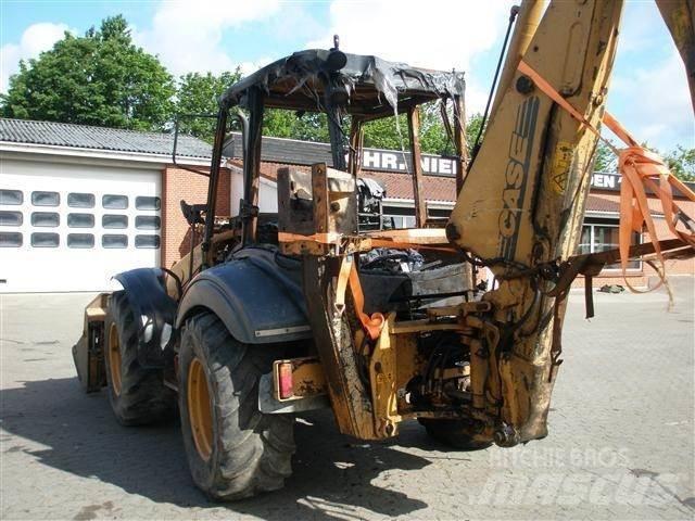 CASE 595 Екскаватори-навантажувачі