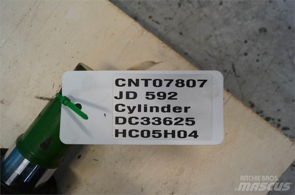 John Deere 592 Захвати для мішків