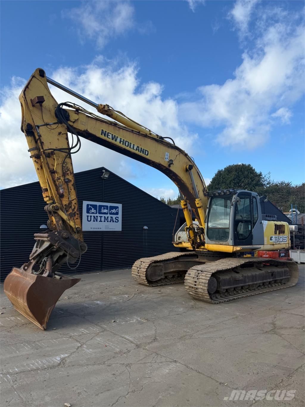 New Holland E305 Гусеничні екскаватори