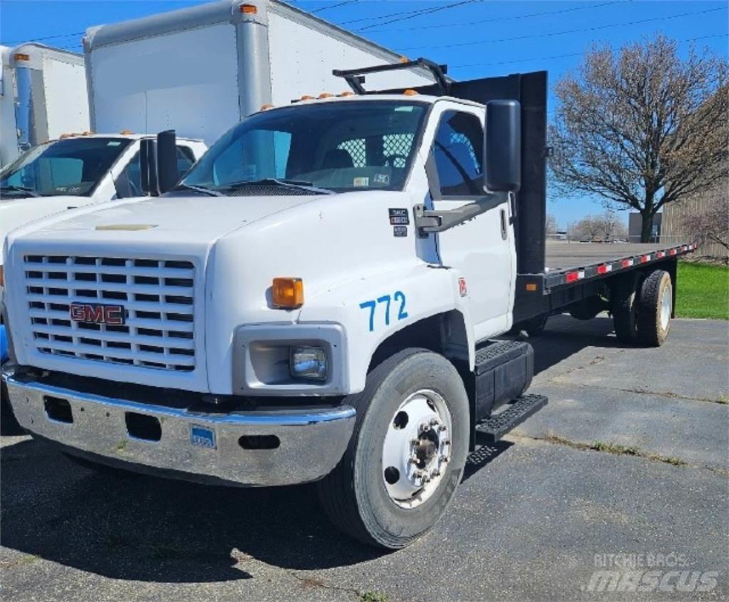 GMC C6500 Вантажівки-платформи/бокове розвантаження
