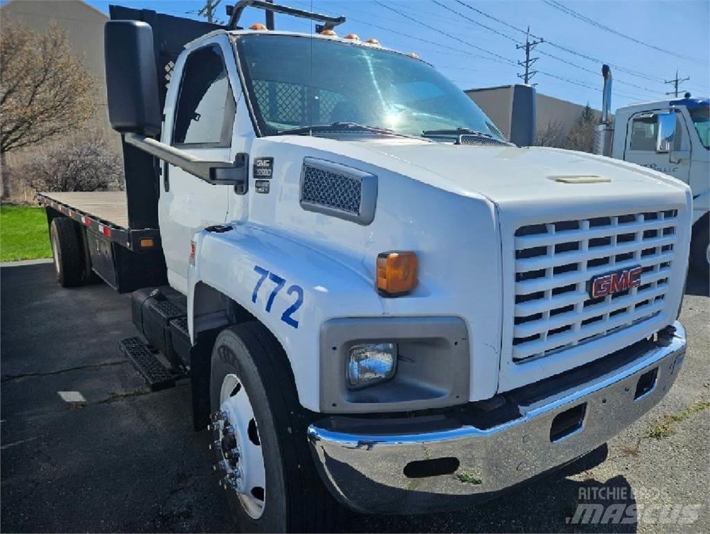 GMC C6500 Вантажівки-платформи/бокове розвантаження