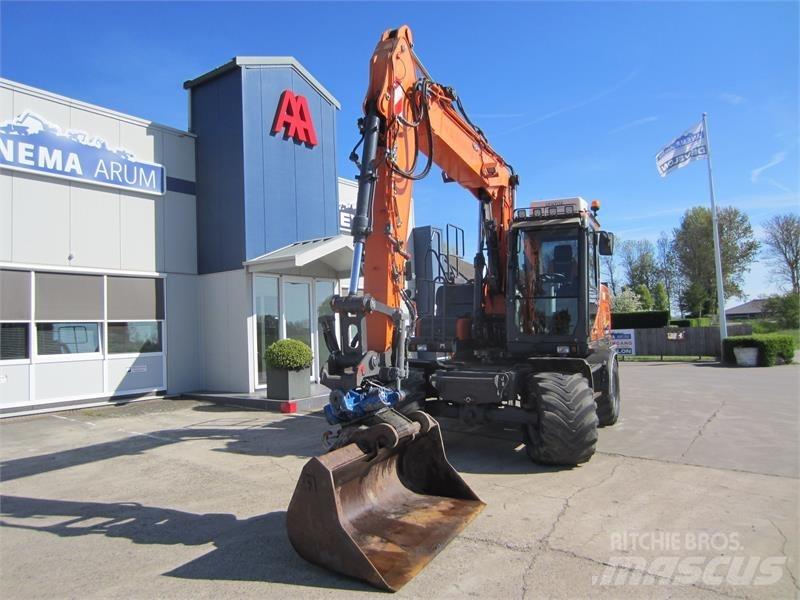 Doosan DX140W-3 Колісні екскаватори