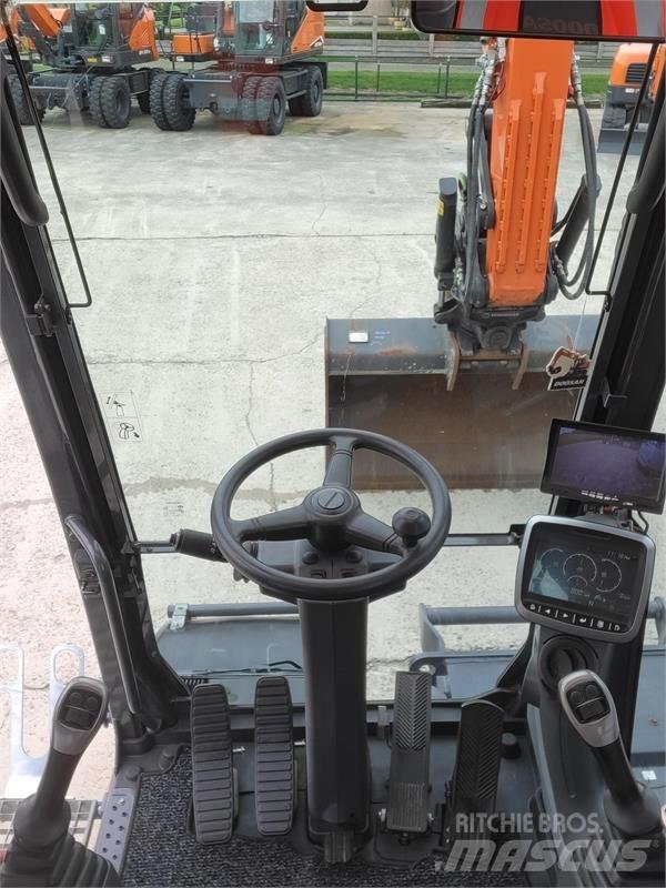 Doosan DX140W-5 Колісні екскаватори
