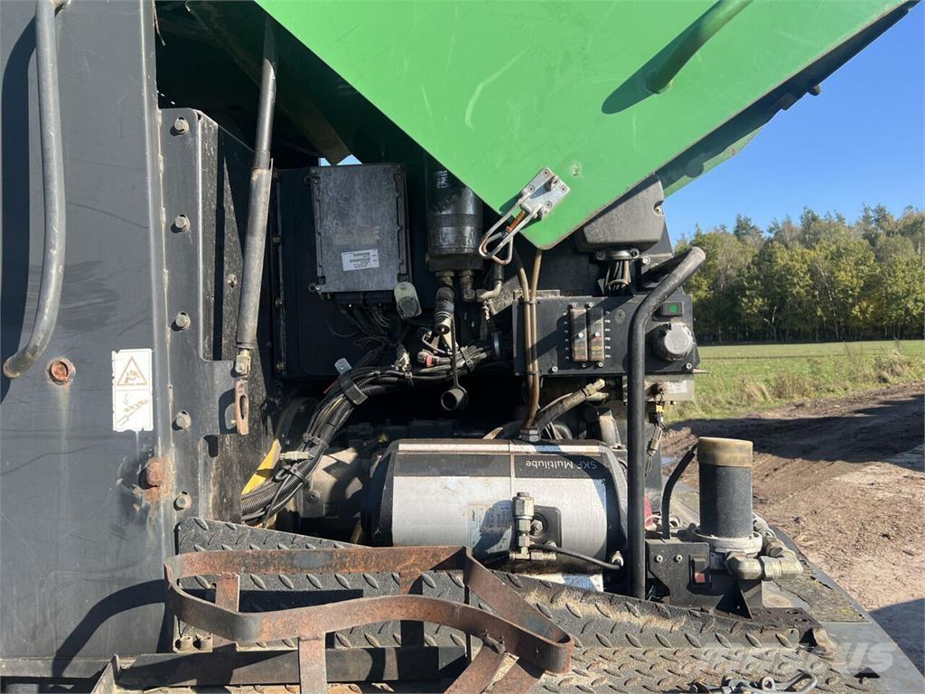 John Deere  Харвестери