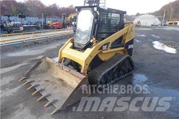 CAT 247B Міні-навантажувачі