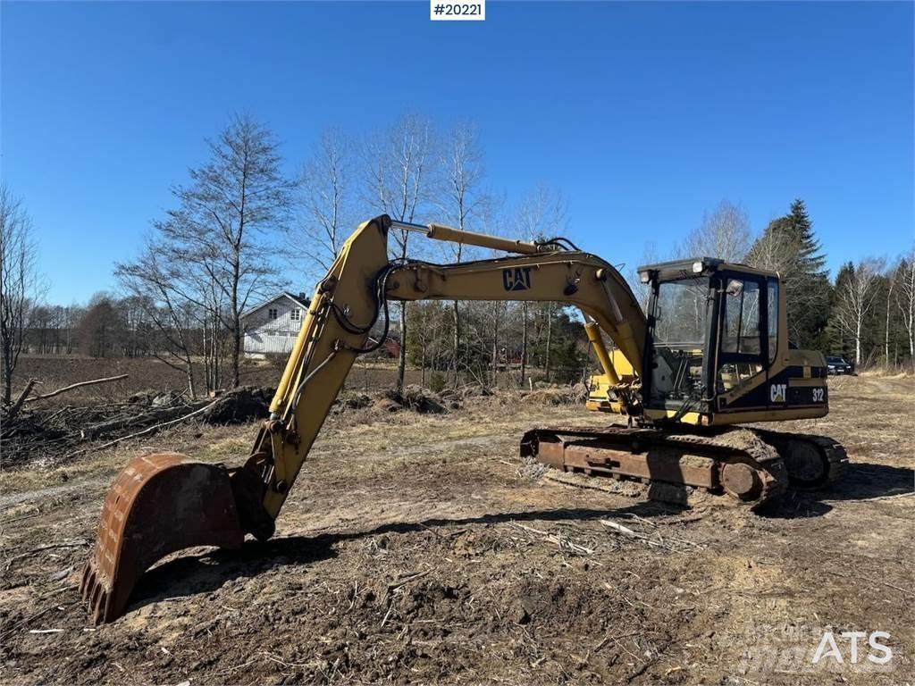 CAT 312 Гусеничні екскаватори