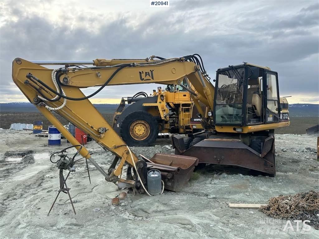 CAT 312 Колісні екскаватори
