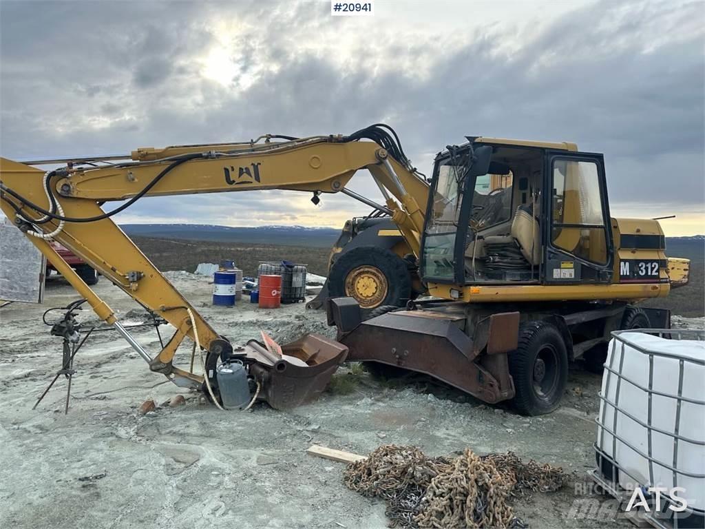 CAT 312 Колісні екскаватори