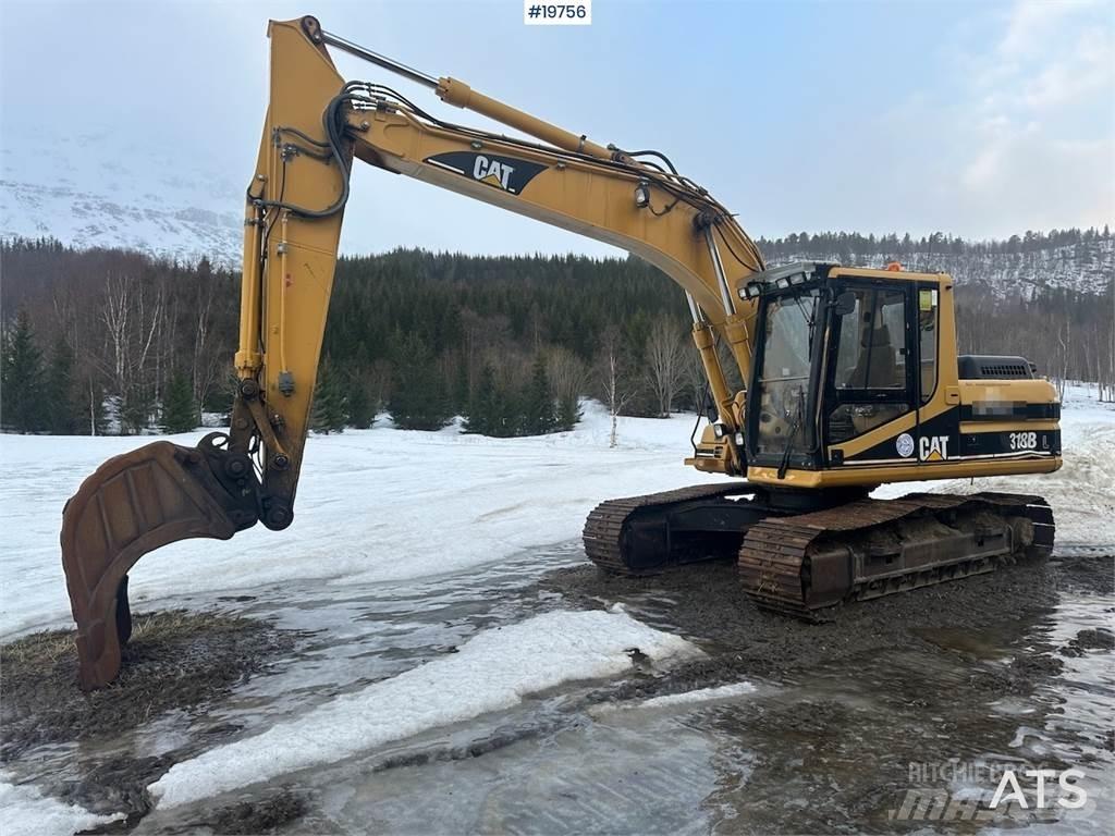 CAT 318BL Гусеничні екскаватори