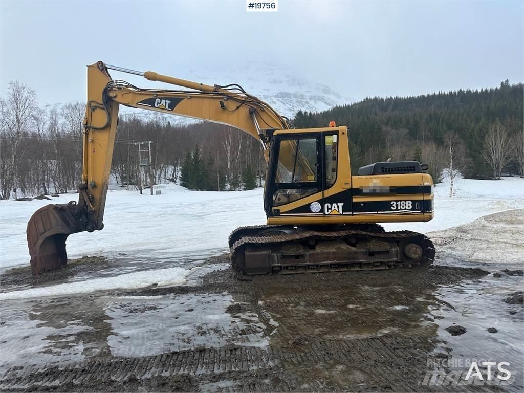 CAT 318BL Гусеничні екскаватори