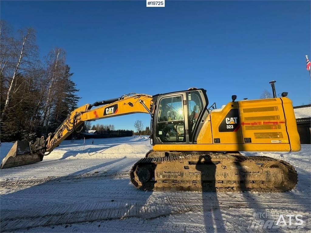 CAT 323 Гусеничні екскаватори