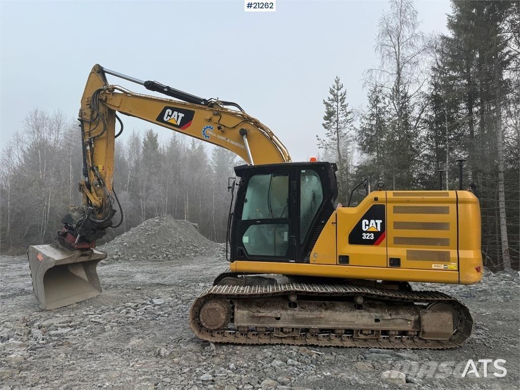 CAT 323 Гусеничні екскаватори