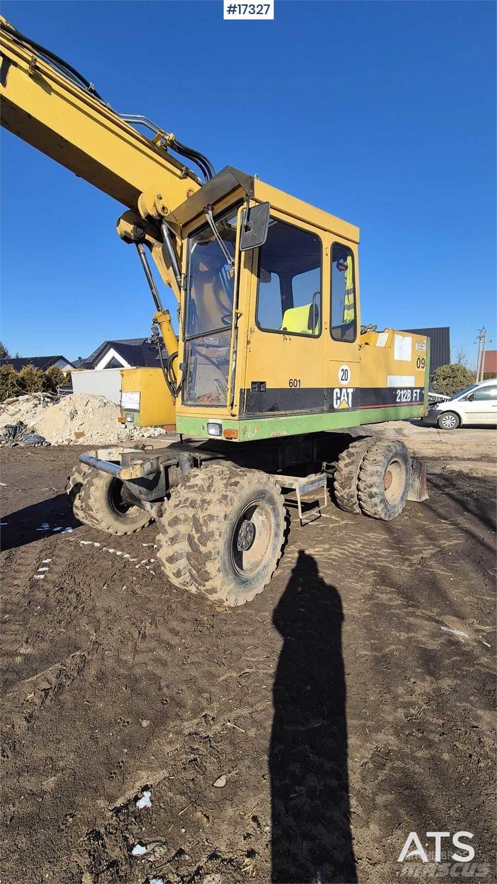 CAT 212BFT Колісні екскаватори